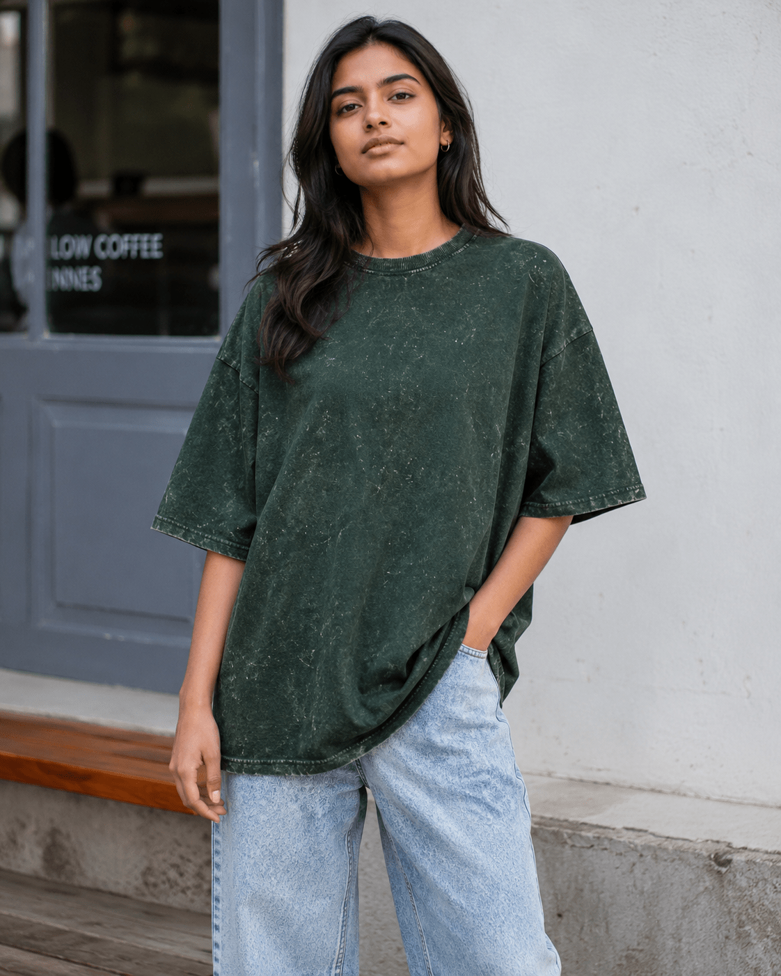 Female model wearing Bottle Green Acid Washed Oversized Tee