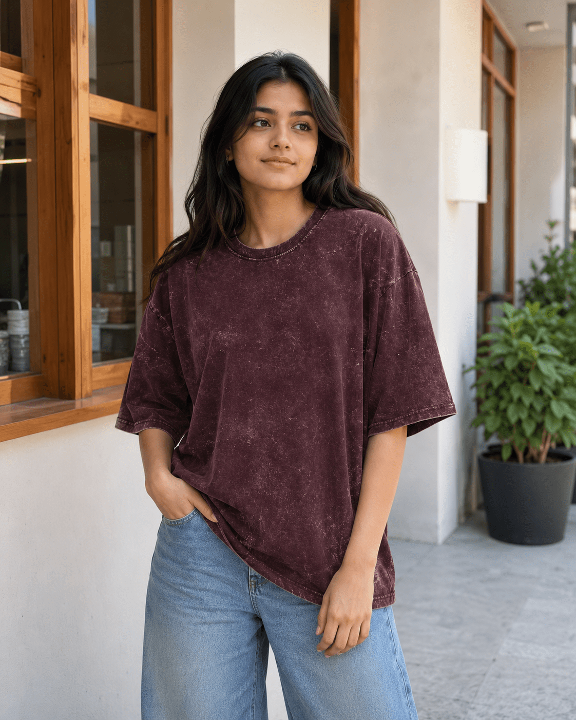 Female model wearing Maroon Acid Washed Oversized Tee