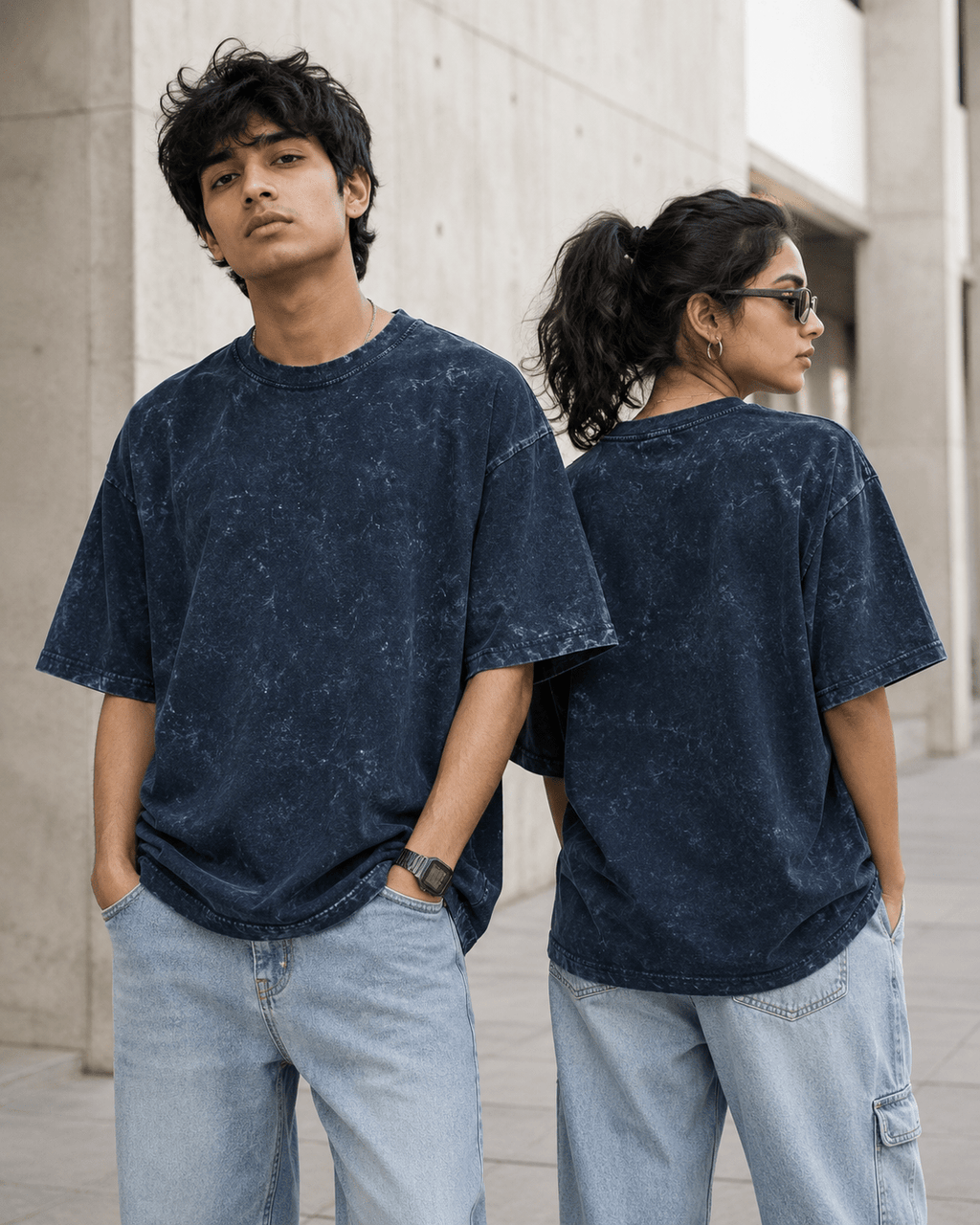 Models wearing Navy Blue Acid Washed Oversized Tee in front and back views